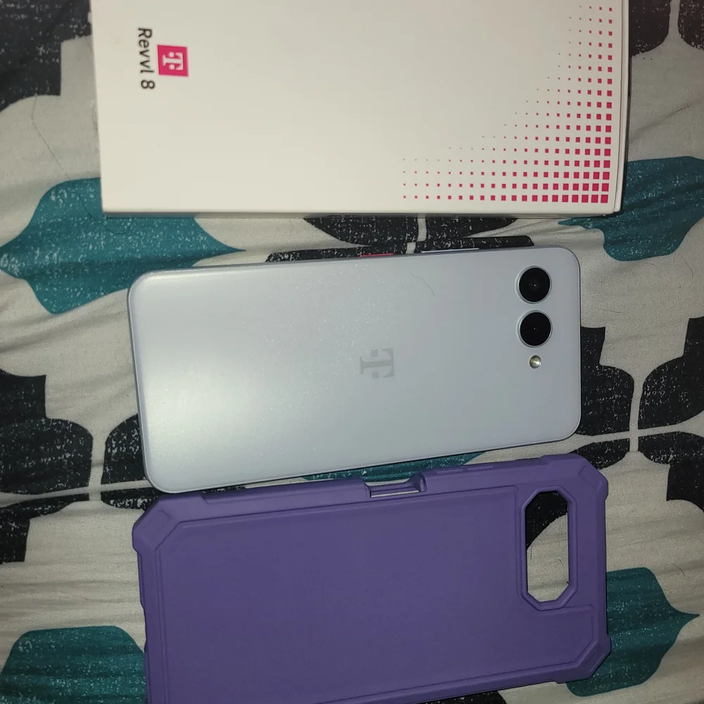 8 White Smartphone with Purple Protective Case